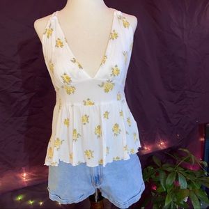 White and yellow floral blouse